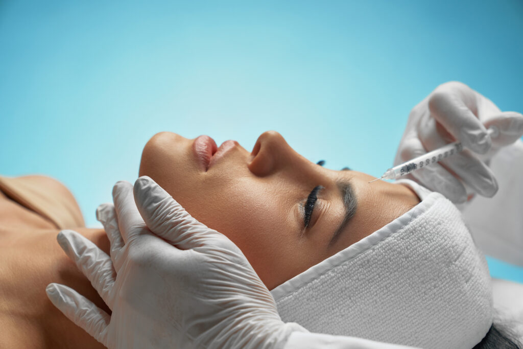 Doctor administering an anti-wrinkle treatment in Clapham
